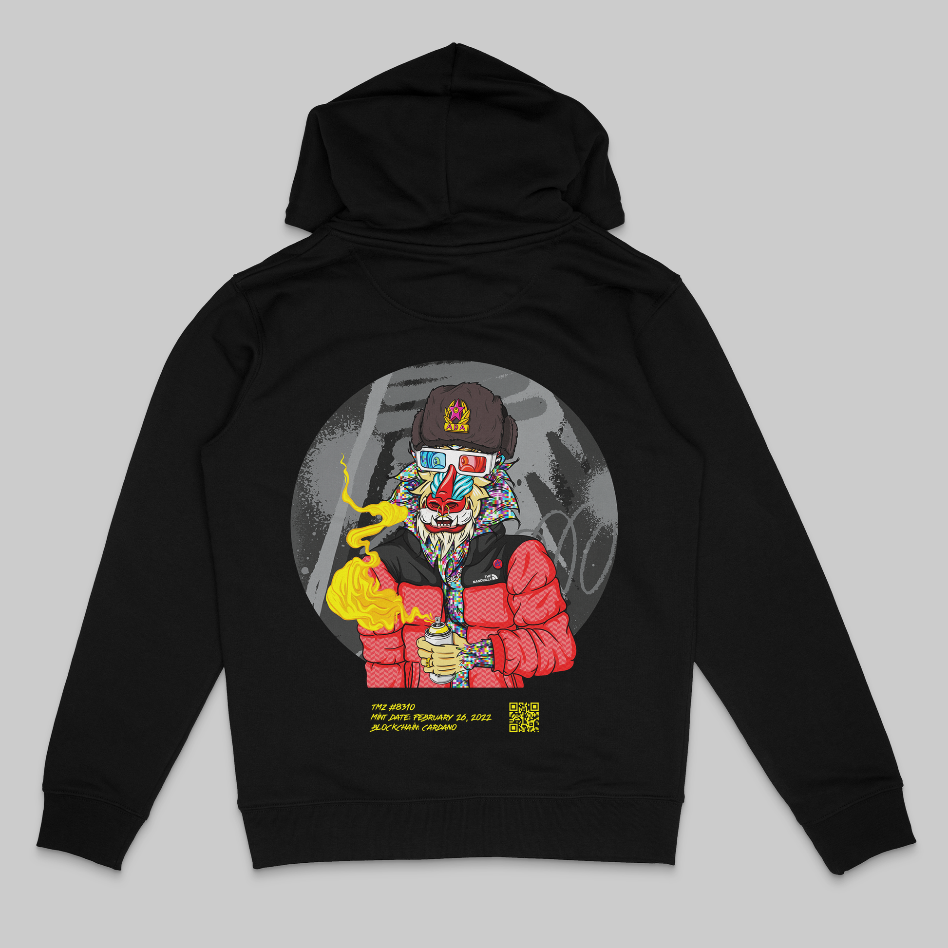 the back side of a black colored hoodie from the brand Stanley Stella with a colorful mandrill print in comic style. Blockchain information under print in yellow letters and QR code